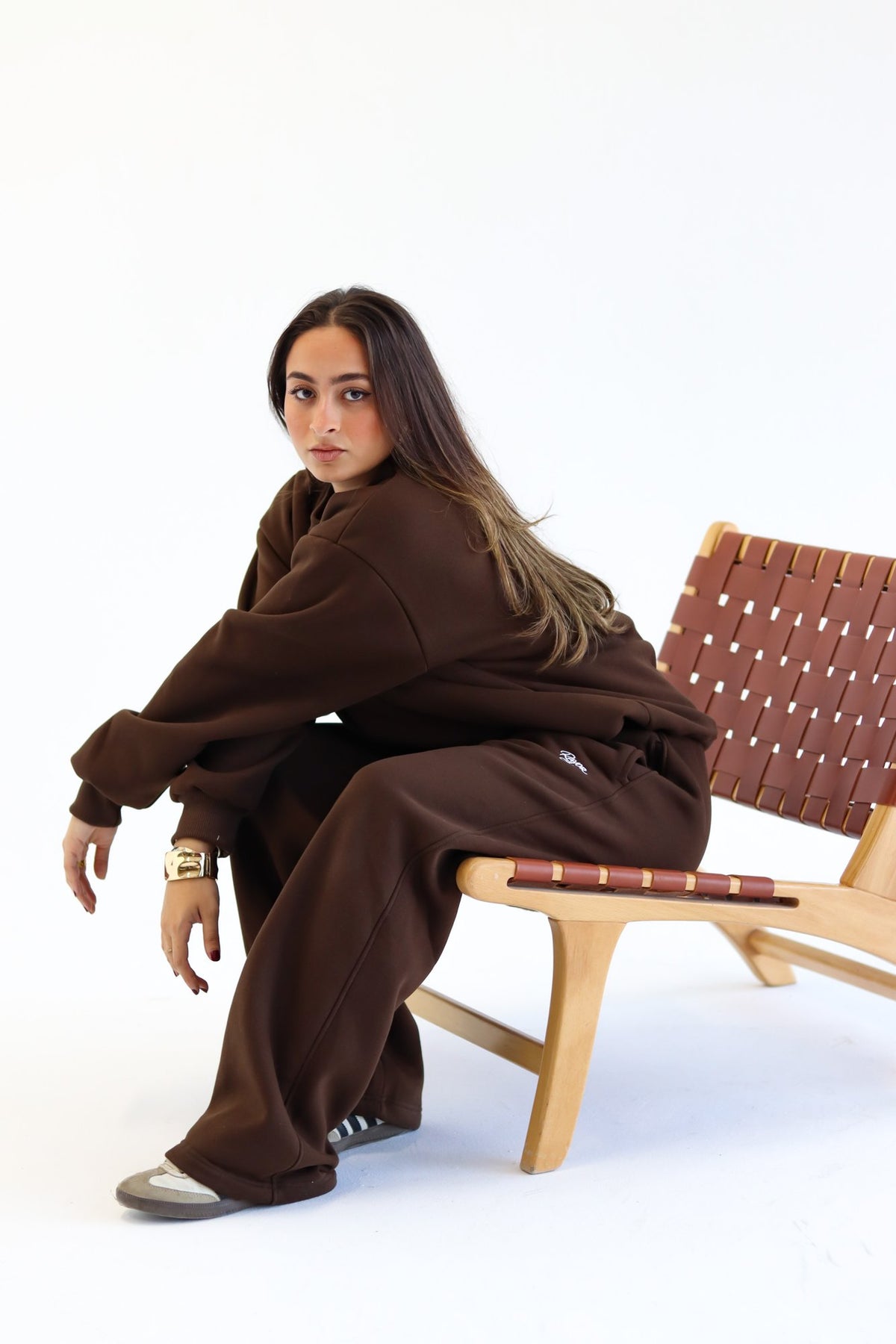 Rayor Winter Collection in Brown, seated lifestyle shot